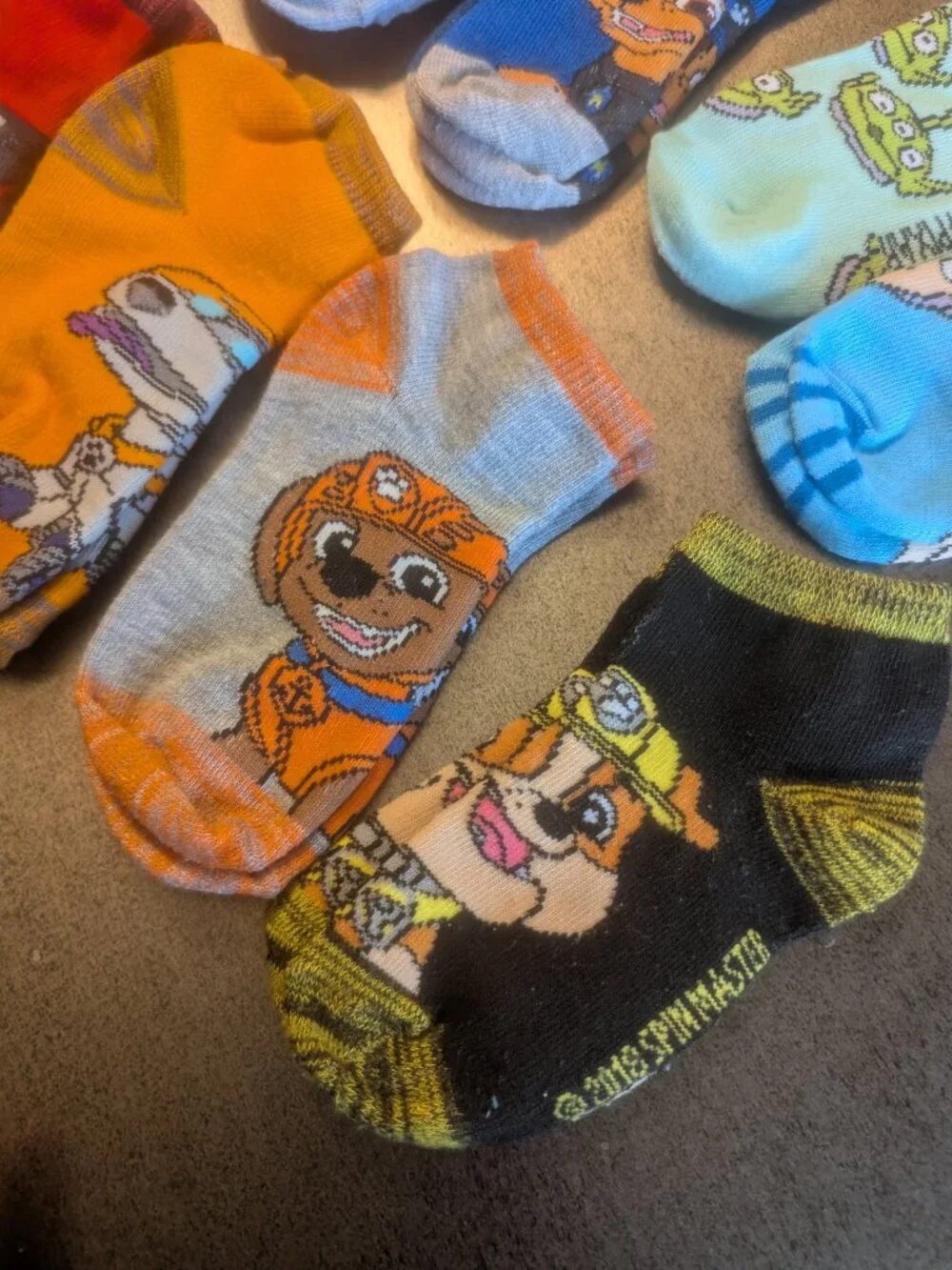 3/$10 - Bundle of 8 Paw Patrol + Toy Story Ankle Socks - M
